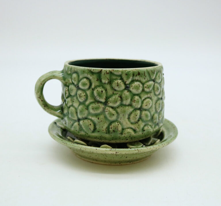 Ceramic Teacup and Saucer by Erin Drake. Lillstreet Gallery Ceramic Teacup and Saucer by Erin Drake. Lillstreet Gallery
