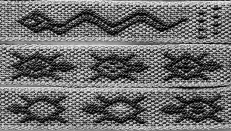Snake and turtle patterns on Inkle Loom band. Annie MacHale Snake and turtle patterns on Inkle Loom band. Annie MacHale