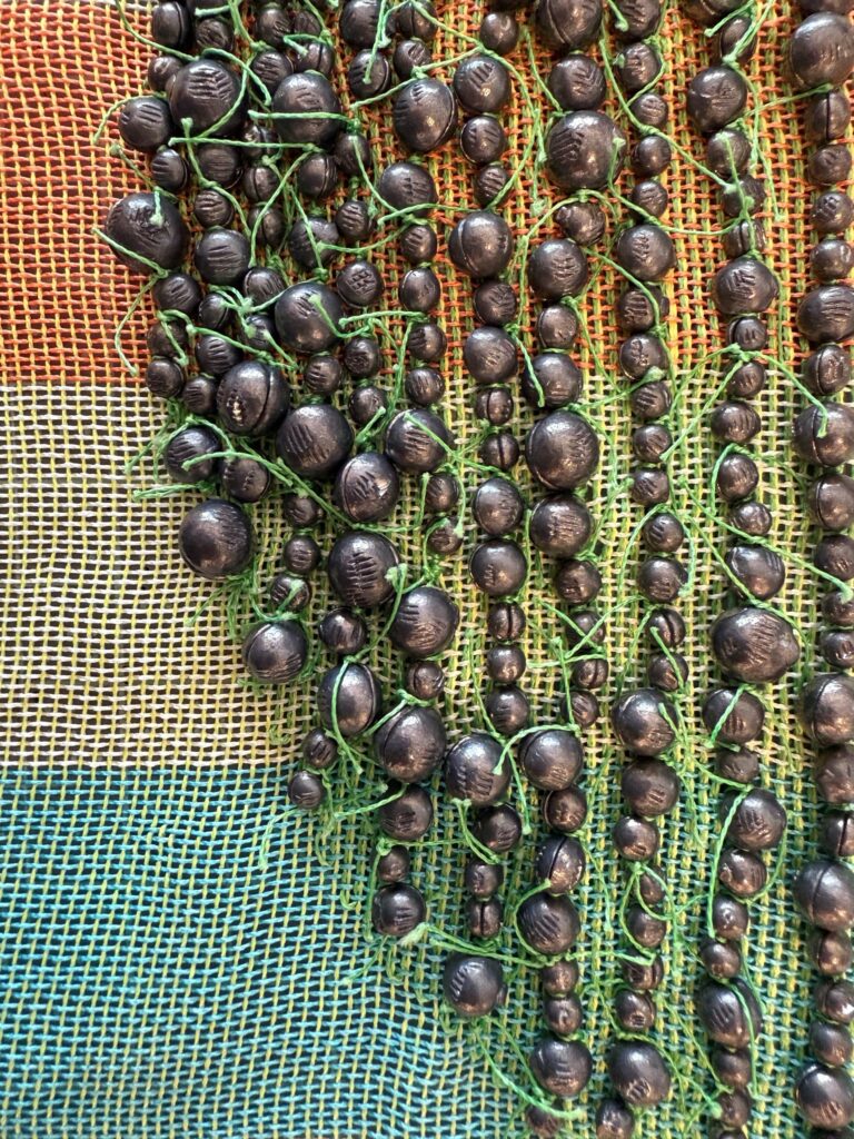 Ann Morton, Hook, Line and Sinker, Series of 3, 2025, Hand woven fishing line - braided; Jen Blazina, Recollection, 2007, 3D mixed media, 48 x 48 x 48 inches. fishing hooks; fishing line - monofilament; fishing sinkers, 16 x 20 inches. Courtesy of the Artist