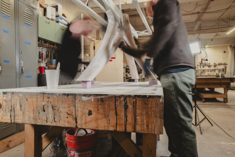 Apprentice and Master Craftsman at work. Bill Green Photography