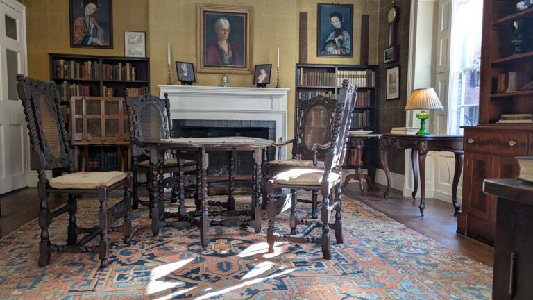 Nichols House Museum Library with chairs carved by Rose Nichols. Nichols House Museum