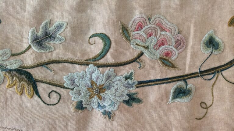 Detail of bed hangings embroidered by Rose Nichols. Nichols House Museum