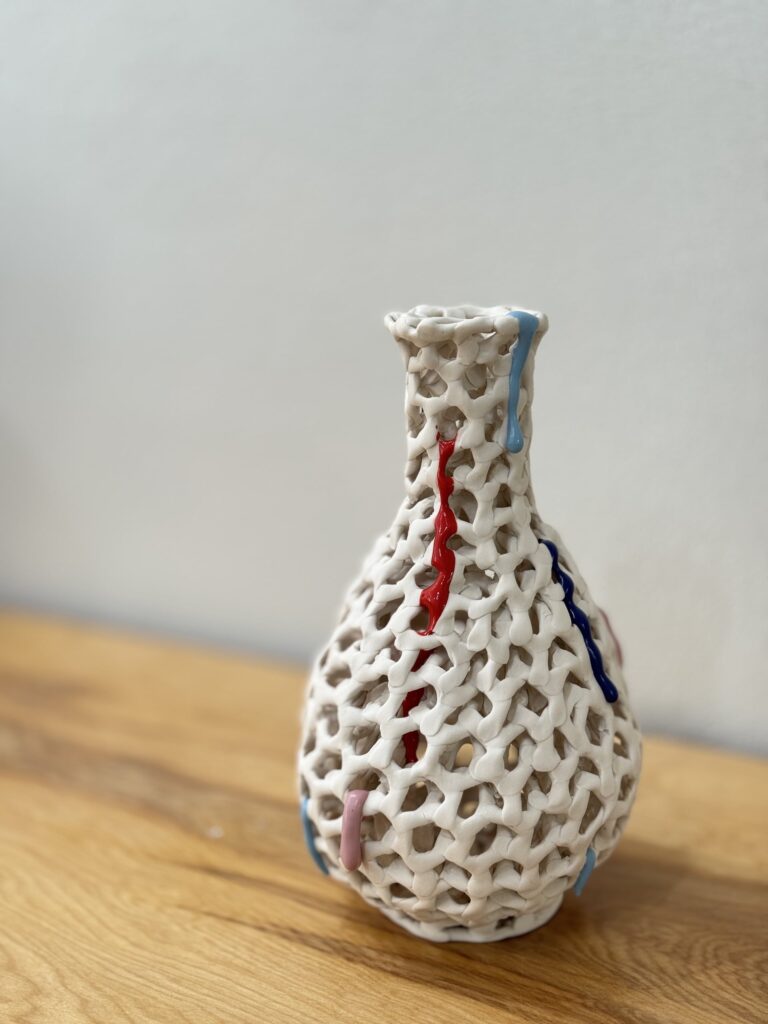 A sculptural bottle by Artist in Residence, Huey Lee from his 2025 solo exhibition. Louis reilly