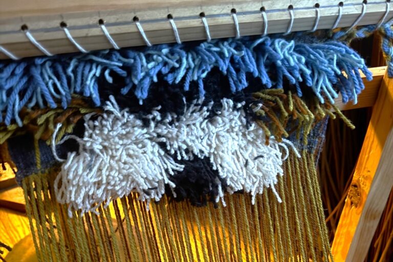 Rya knots on a loom Rya knots on a loom. American Swedish Institute