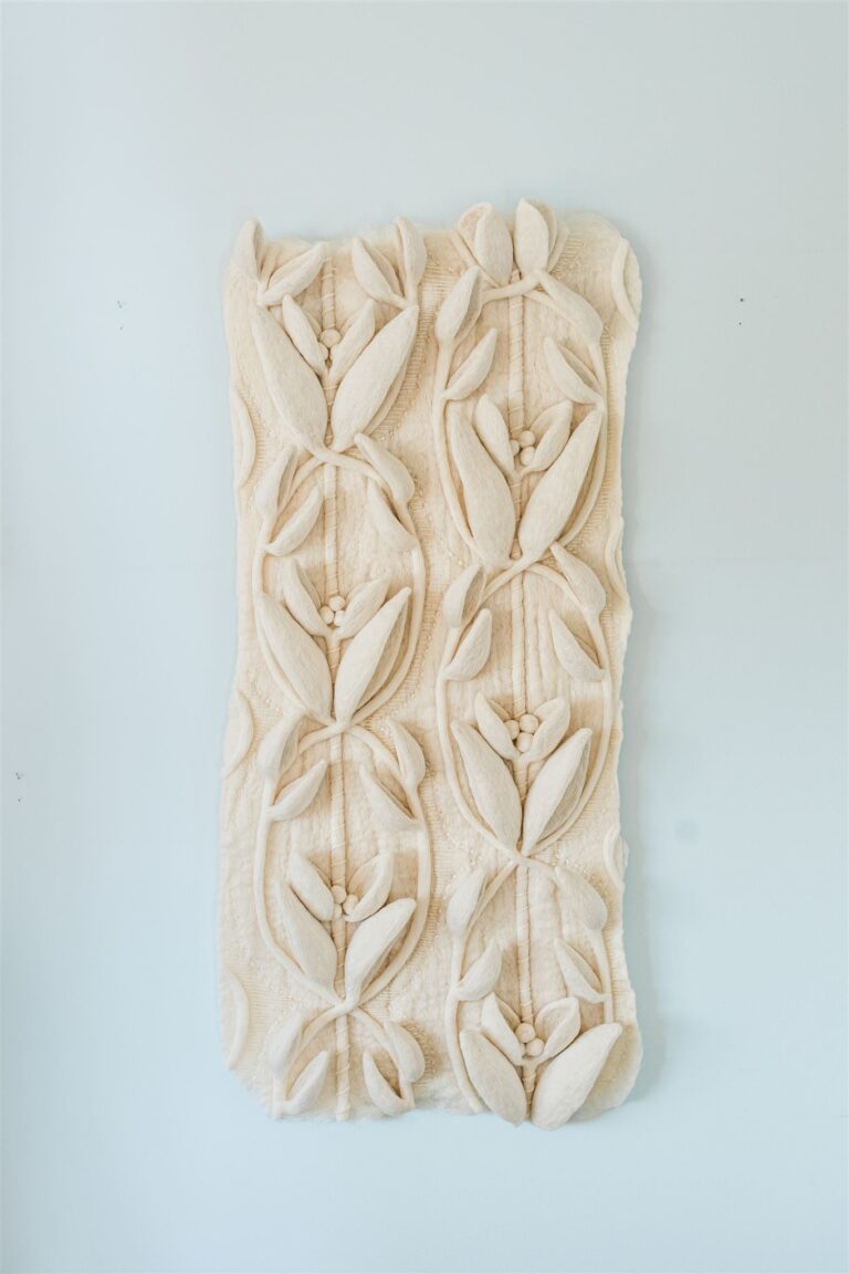 Holly Guertin, Worthwhile, 2026, wool wet- and needle-felt, embroidery, 19.5"w x 42.5"h x 3"d. Artwork by Holly Guertin, Photo by Erin Ingraffia Photography