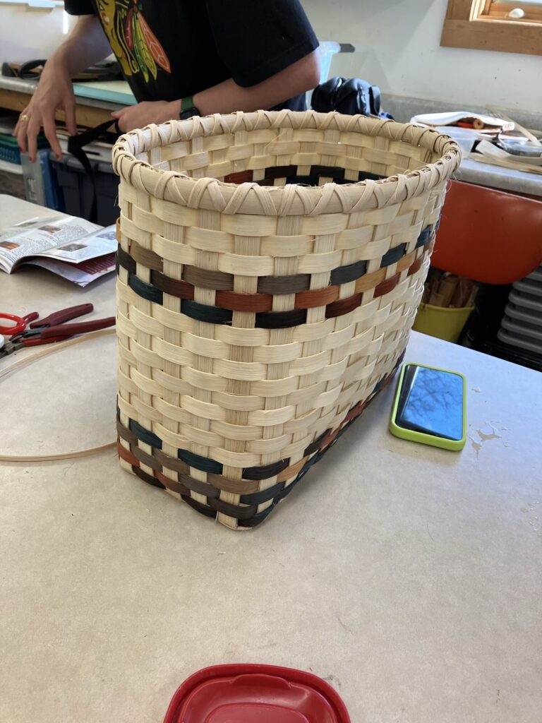 Basketry Class (basket by Ellen Phillips). Fine Line Staff