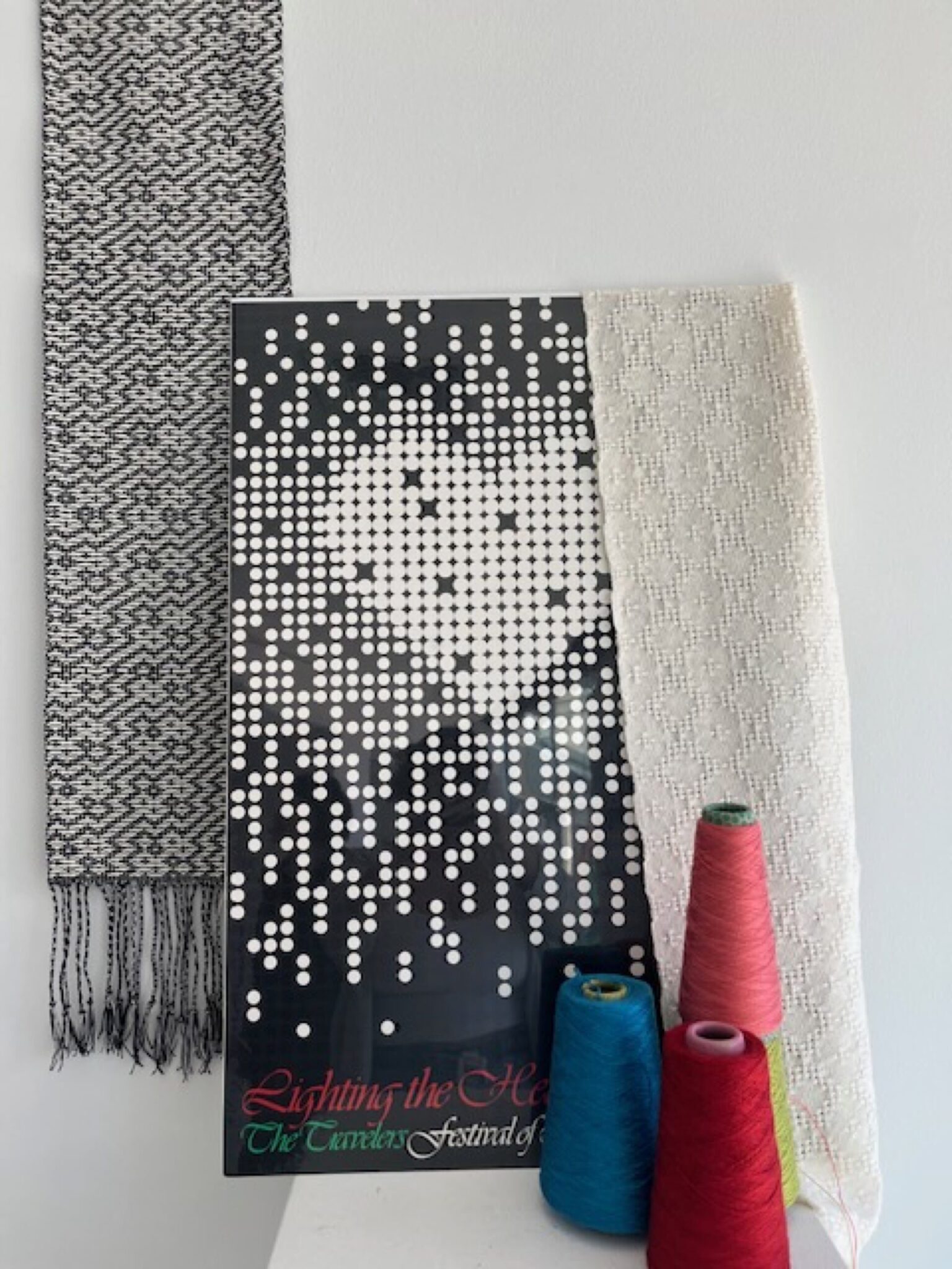 Graphic poster from Hartford Public Library meets the contemporary hand-woven designs of the Hartford Artisans Weaving Center—where community and textile artistry intertwine. Hartford Artisans Weaving Center