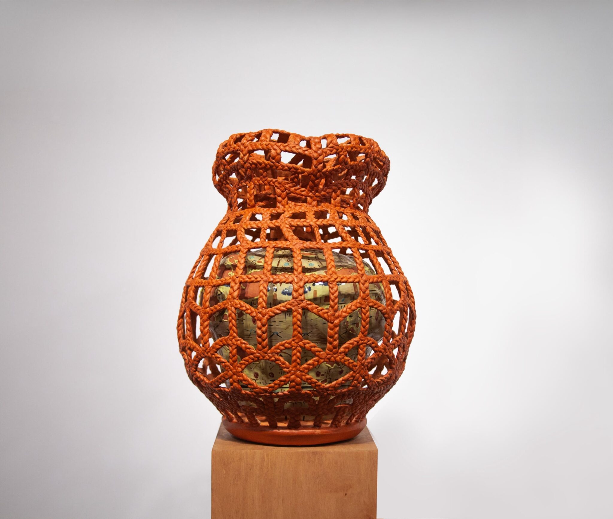 Chelsea McMaster, The Caged Bird, Multi-portrait vessel finished with terra Sigillata and vitreous slip. Image courtesy of the artist