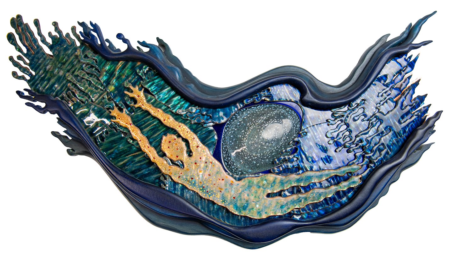 Enameled metal panel featuring a human figure swimming alongside a large jellyfish. Martha Banyas, Winter’s Water: Rite of Passage, 2013. Copper, enamel, and wood. Metal Museum Permanent Collection 2023.9.9