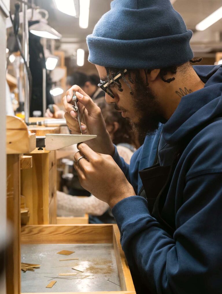 Jewelry Making & Repair student working at their bench. North Bennet Street School