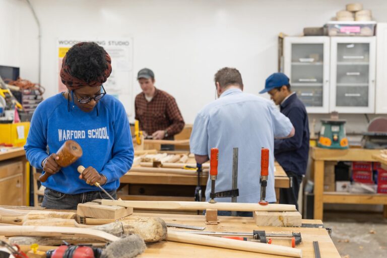Students in the Snow Farm Woodworking studio. Snow Farm