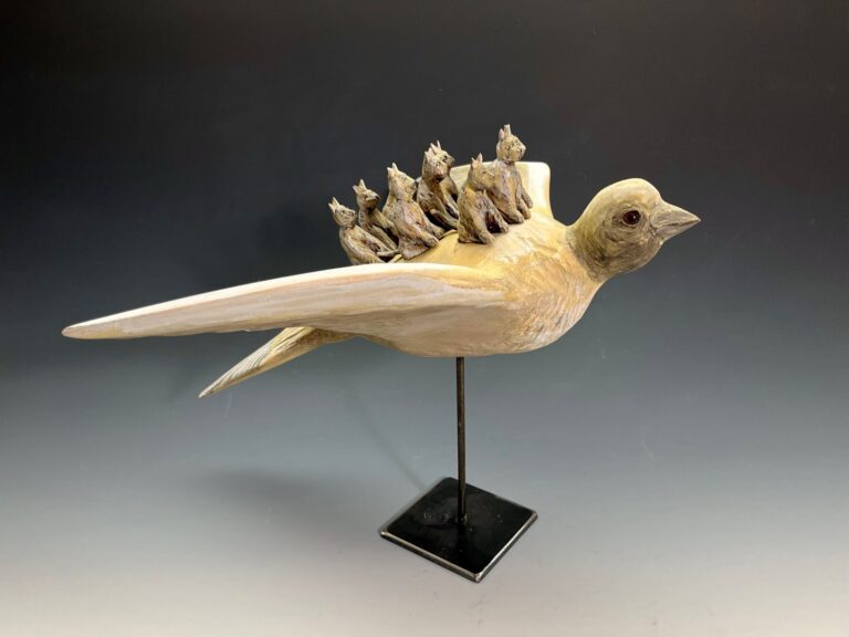 Stan Peterson, Nine LIves, hand-carved basswood with milk paint and graphite, 10" x 18" x 18". Courtesy of the artist