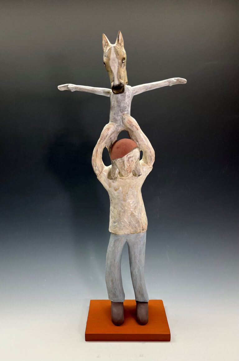 Stan Peterson, Horseplay, 2025, hand-carved basswood with milk paint and graphite, 25½" x 11" x 6". Courtesy of the artist