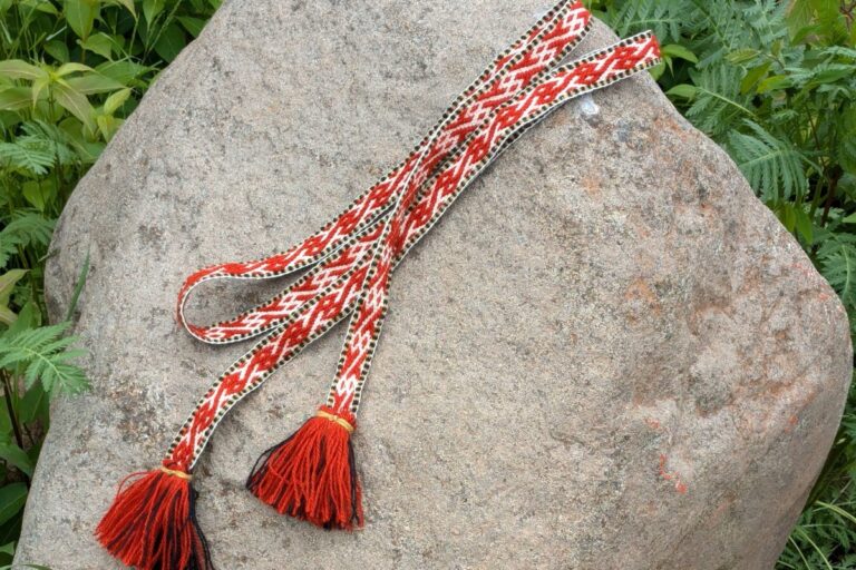 Woven band on a large rock. American Swedish Institute