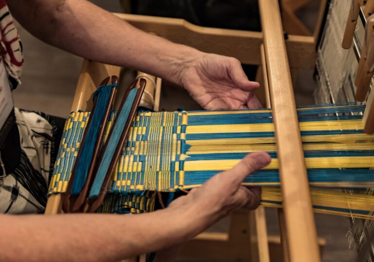 Weaving on a Loom. Photo by David Rorick
