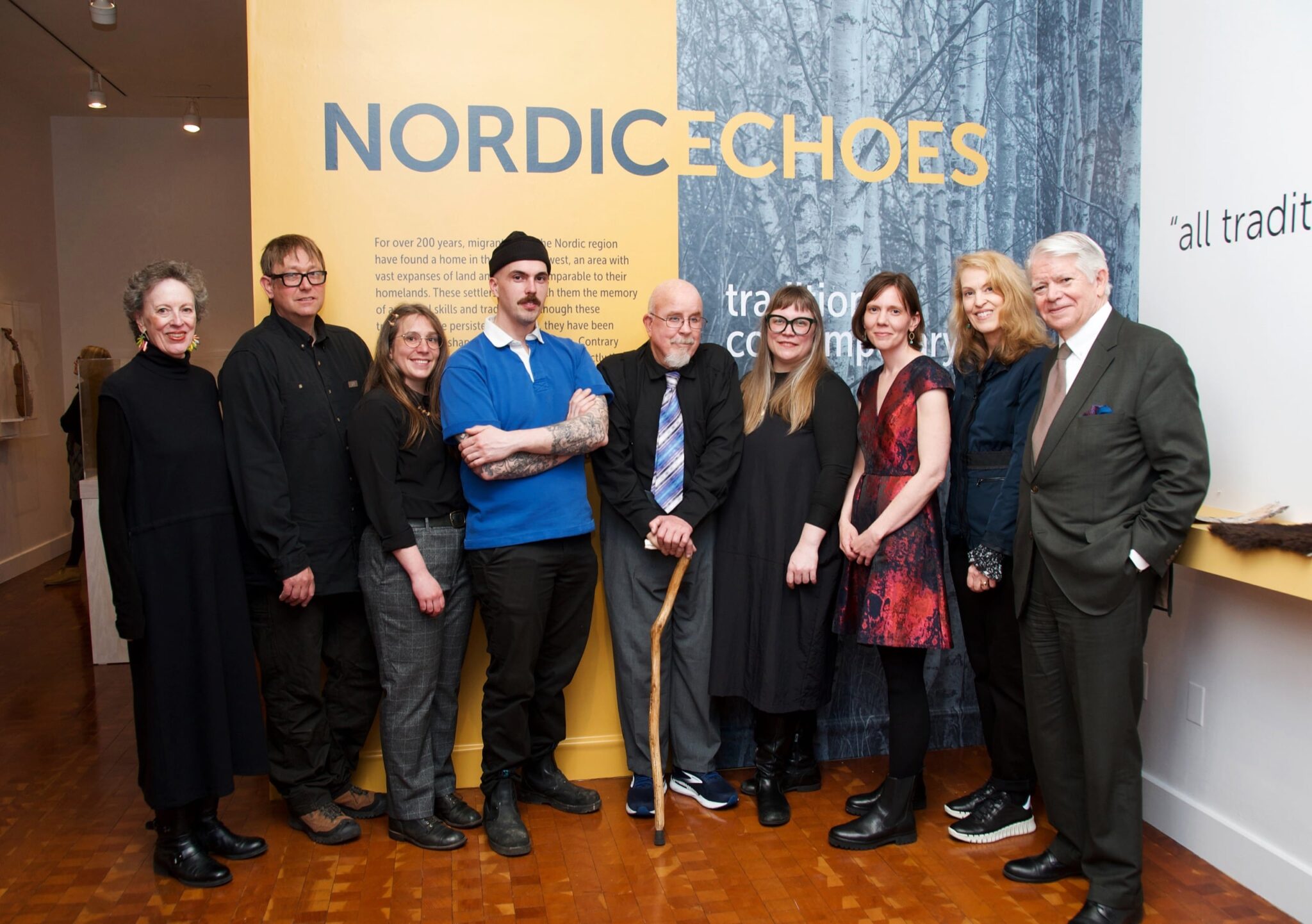 An image of the Nordic Echoes exhibit opening at Scandinavia House, featuring (L to R) Sally Yerkovich (Director of Educational Exchange & Special Projects at ASF), artists K.J. Groven, Beth Kraus, Nate White, Peter “Pekka” Olson, Tia Keobounpheng, Amber Jensen, Sonja Peterson, and ASF President/CEO Edward Gallagher. Photo credit to Maria Melin.