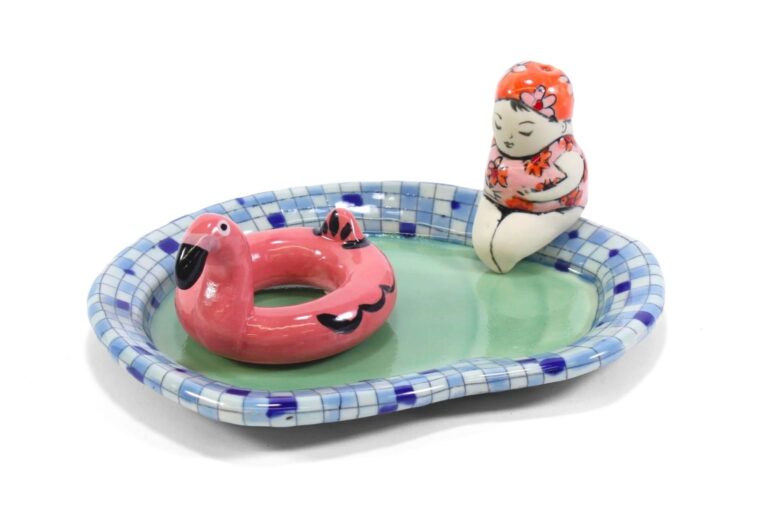 Chandra DeBuse, Swimming Pool Salt and Pepper Shaker, 2019. Ceramic; Pool: 0.75 x 5.5 x 6.75; Flamingo: 2 x 3 x 2.5 in; Figure: 2.5 x 1.75 x 1.25 in. Chandra DeBuse, Swimming Pool Salt and Pepper Shaker, 2019. Ceramic; Pool: 0.75 x 5.5 x 6.75; Flamingo: 2 x 3 x 2.5 in; Figure: 2.5 x 1.75 x 1.25 in. Image by Belger Arts/Courtesy of Belger Collection.