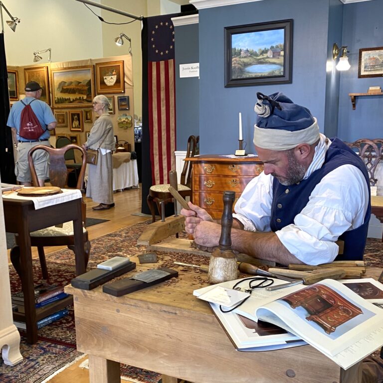Furniture Maker Justin Kaufman Showcases Traditional Woodworking Skills at the Waterford Fair. T. Kirkman
