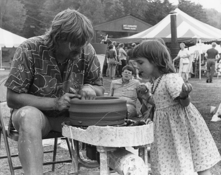 Dwight Graves with a young student at the 1987 Fair. Unknown photographer, 1987