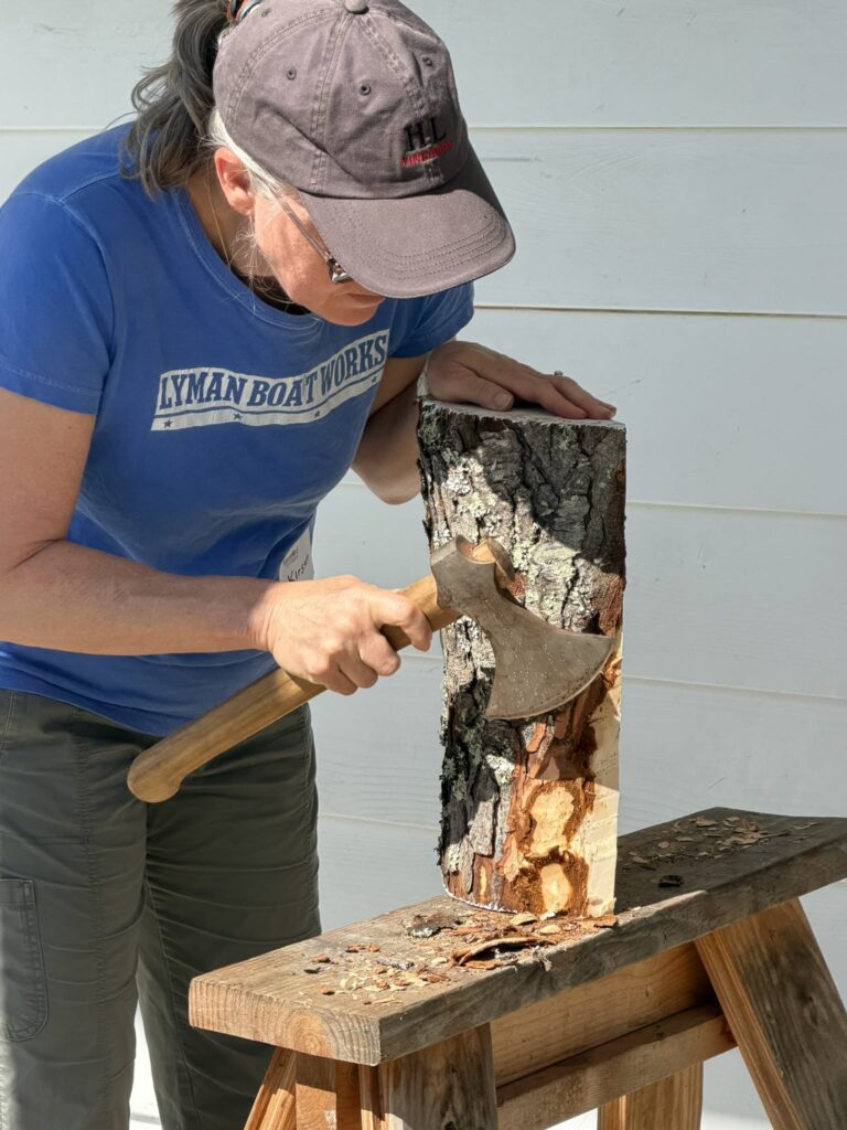 A Student Begins the Process of Carving a Wooden Bowl from a Log. S. Kelly