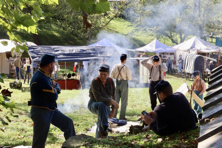 Reenactors Demonstrate Everyday Life in a Historic Encampment on Bond Street Reenactors Demonstrate Everyday Life in a Historic Encampment on Bond Street. S. Kelly