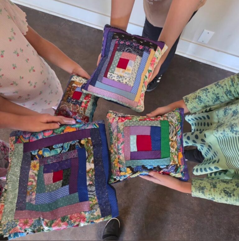 Log Cabin Quilt pillows made by students. Waldorf Handwork Educators