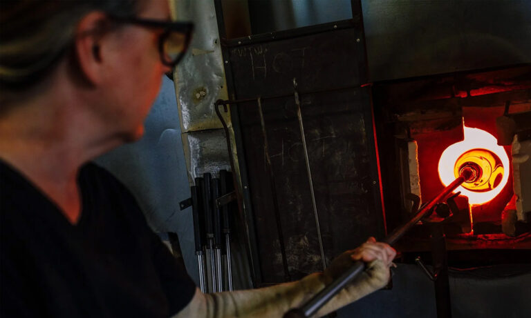 Glass artisan Susan Haas at work Glass artisan Susan Haas at work. Susan Haas