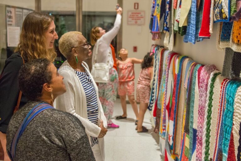 Visitors explore the Welcome Blanket collection at its inaugural exhibition, Smart Museum of Art, Chicago, 2017 Visitors explore the Welcome Blanket collection at its inaugural exhibition, Smart Museum of Art, Chicago, 2017. Photo courtesy of Smart Museum of Art