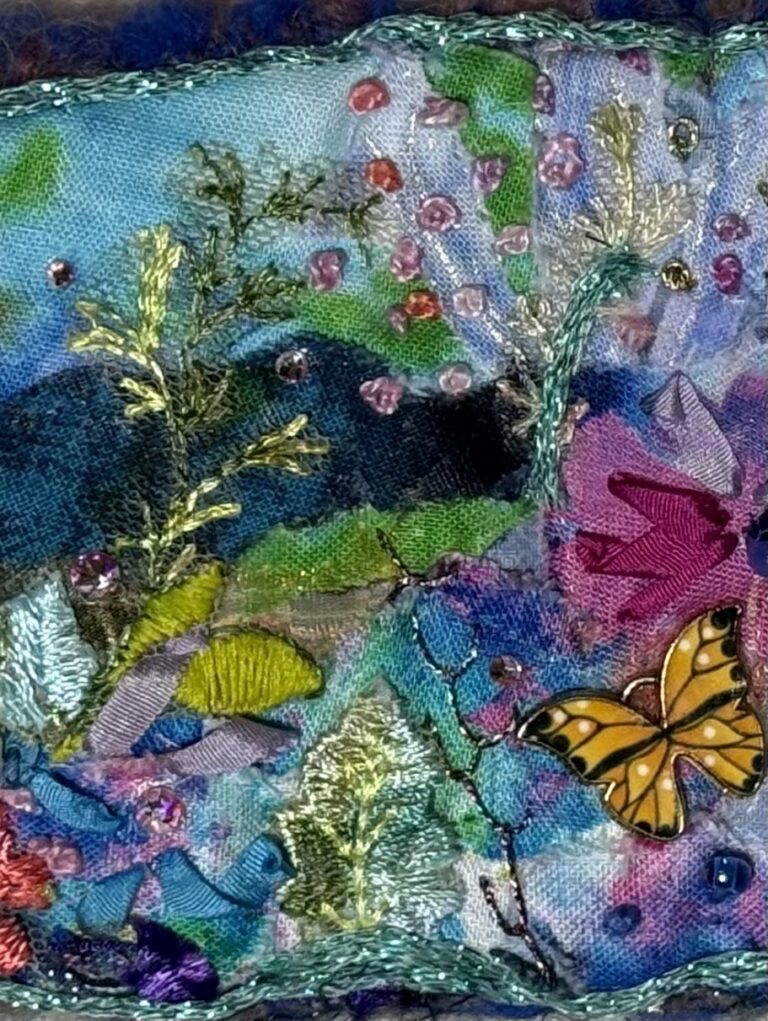 Barbara Dove, Meadow and Mountains, 3″ vertical, 9 1/2″ horizontal collage, embroidery, cotton fabric, silk ribbon, floss, perle cotton, thread, beads, rhinestones Barbara Dove, Meadow and Mountains, 3" vertical, 9 1/2" horizontal collage, embroidery, cotton fabric, silk ribbon, floss, perle cotton, thread, beads, rhinestones. Barbara Dove