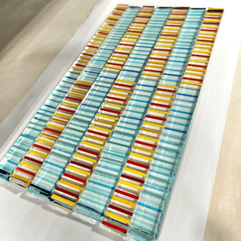 Project example for “Layer, Line, and Luster: The Multi-Fire Glass Journey” glass colored strips. Project example for "Layer, Line, and Luster: The Multi-Fire Glass Journey". Image by Belger Arts