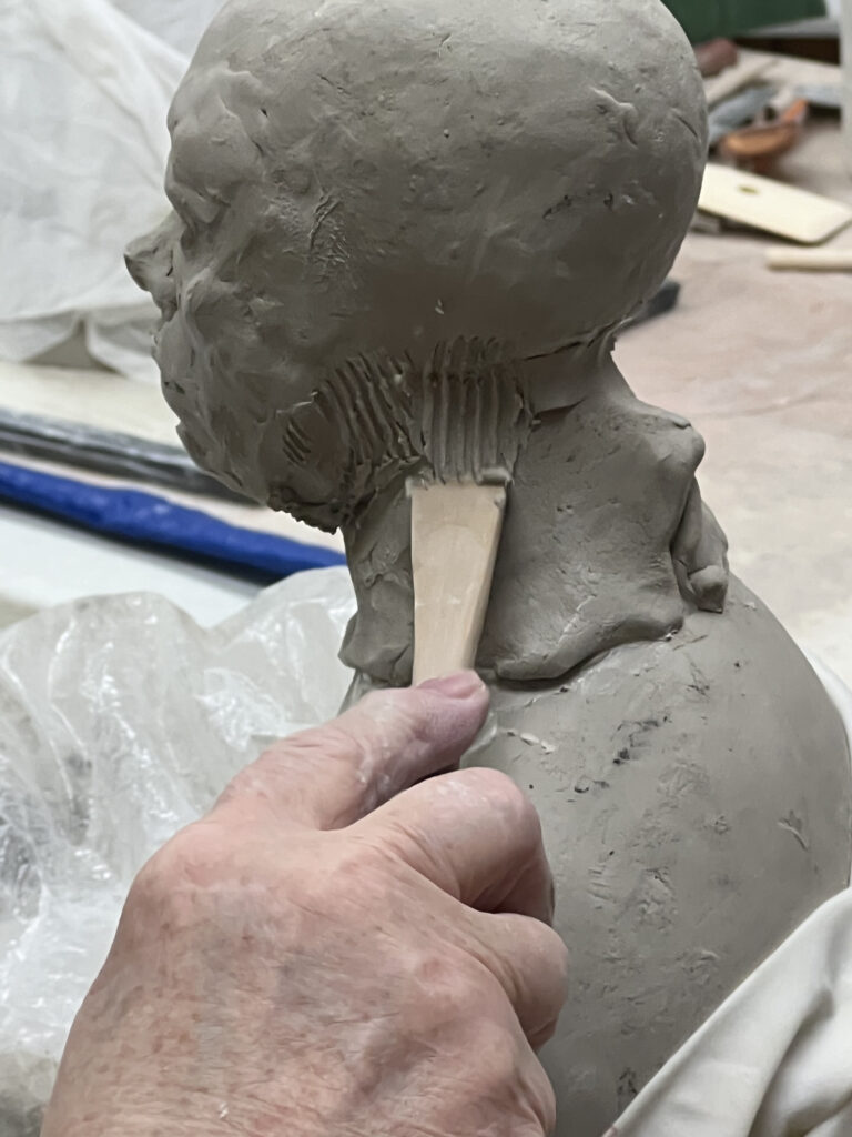 Modeling a Head in clay Modeling a Head in clay. Katharine Schmidt