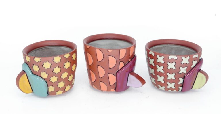 Cups. Taylor E. Mezo