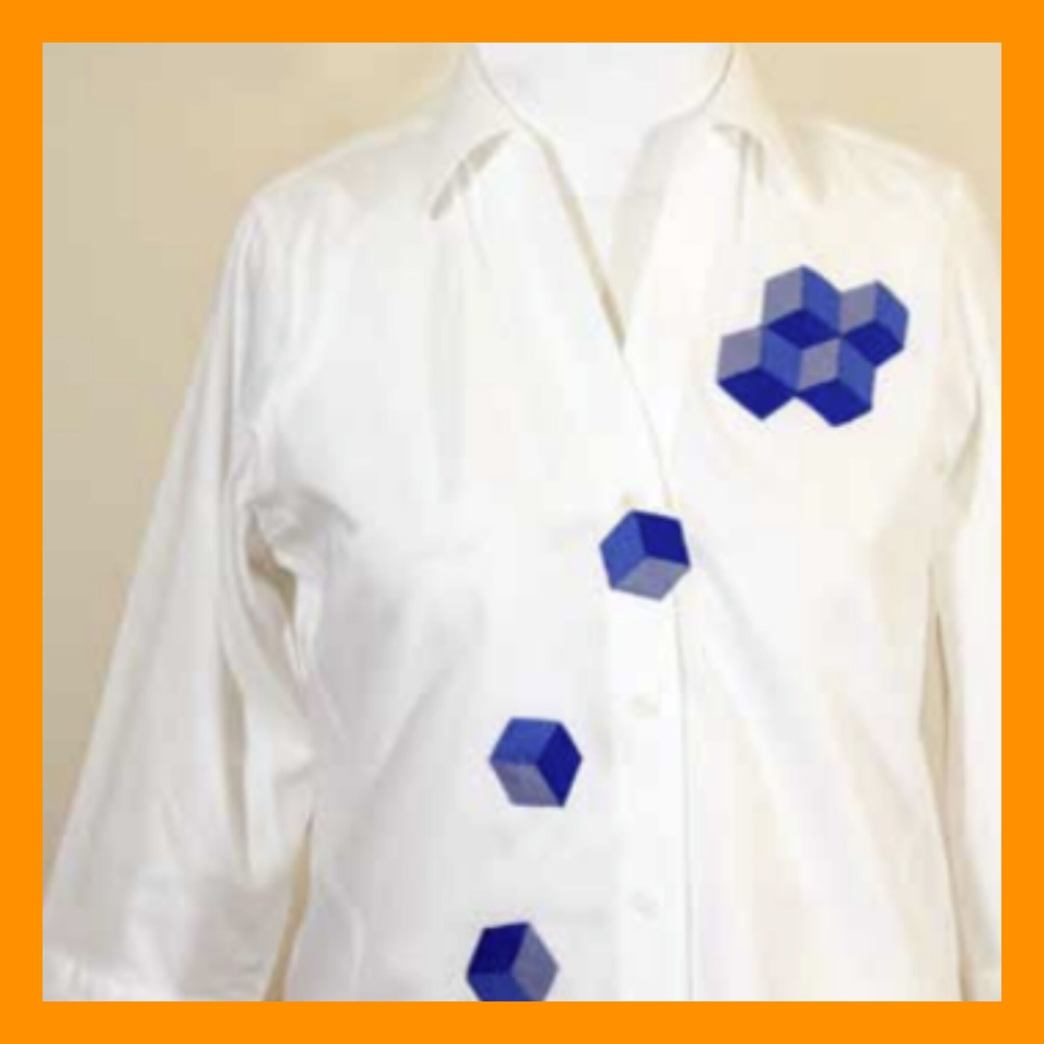 White button up shirt with blue bocks tumbling down diagonally. SFD