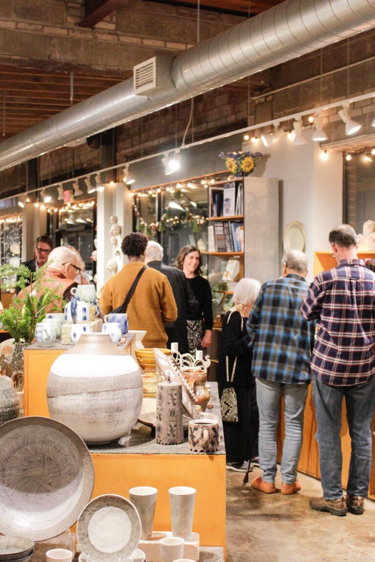 Visitors in the gallery. Northern Clay Center