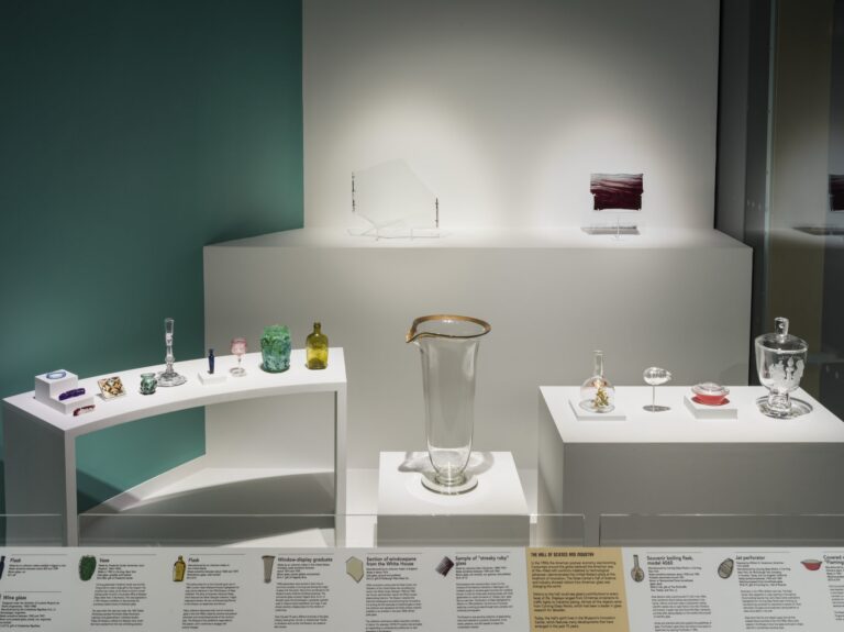 Display cases of the exhibition "More than a Museum". Image courtesy of the Corning Museum of Glass.